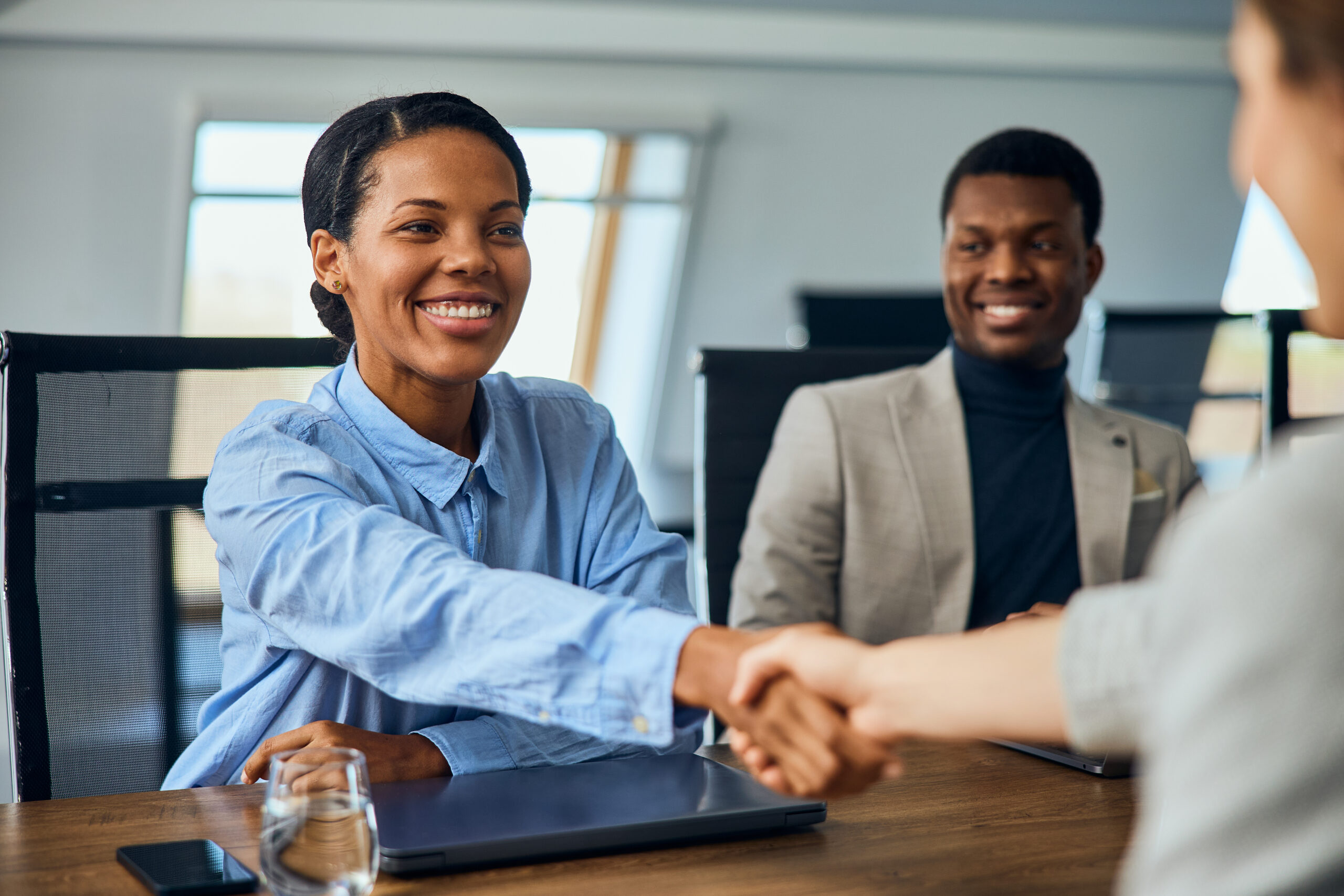 A newly hired job applicant for marketing job accepting the offer.
