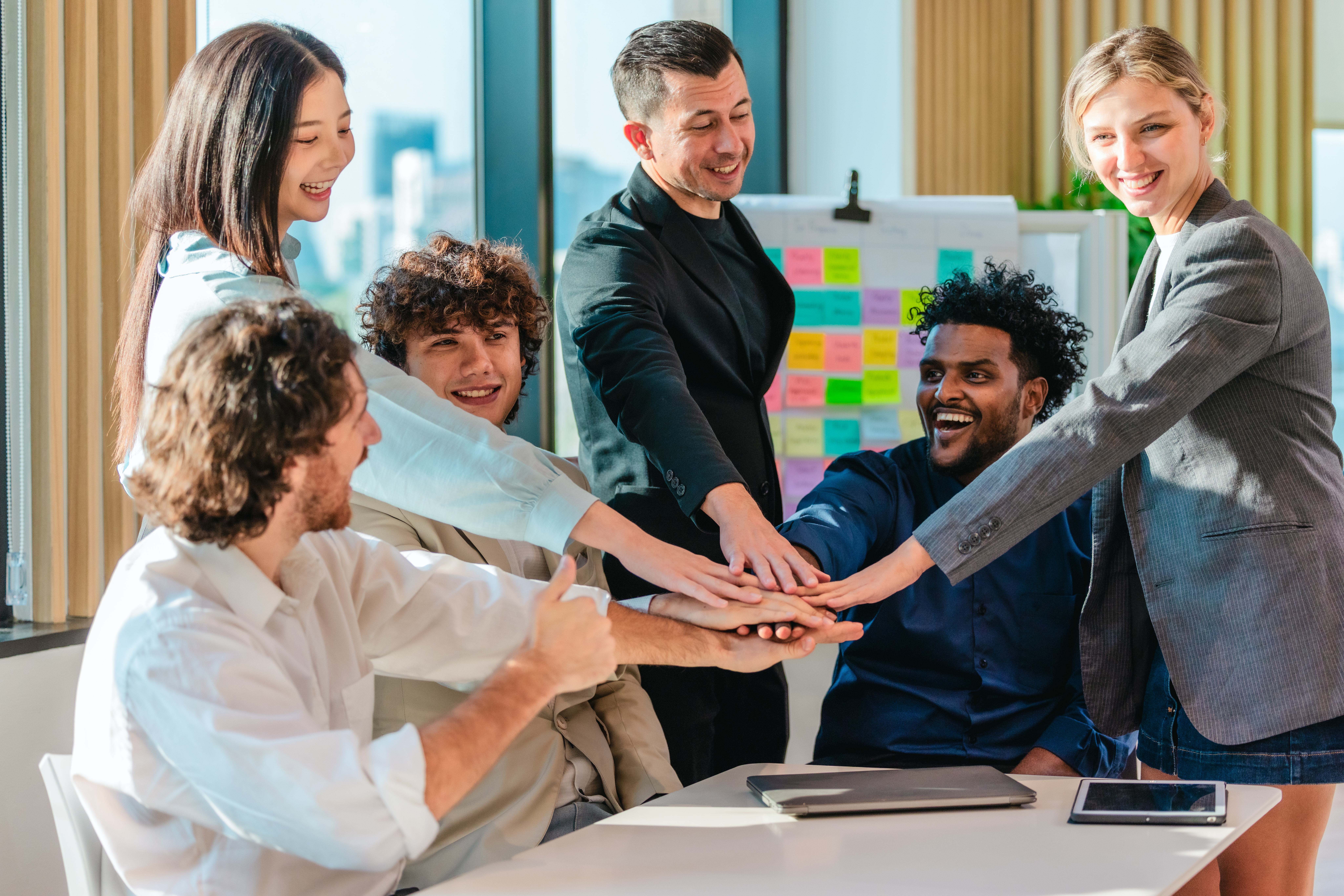 A team with good professional skills stacking their hands.